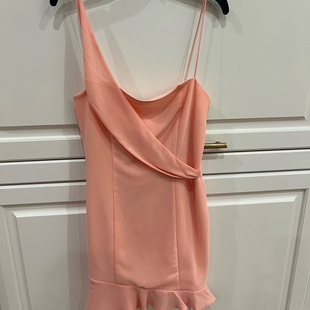 NWT coral dress in size x sm by NBD. Polyester.